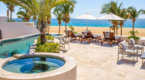 Spectacular 3-Story Beachfront Villa with a Huge Pool Patio